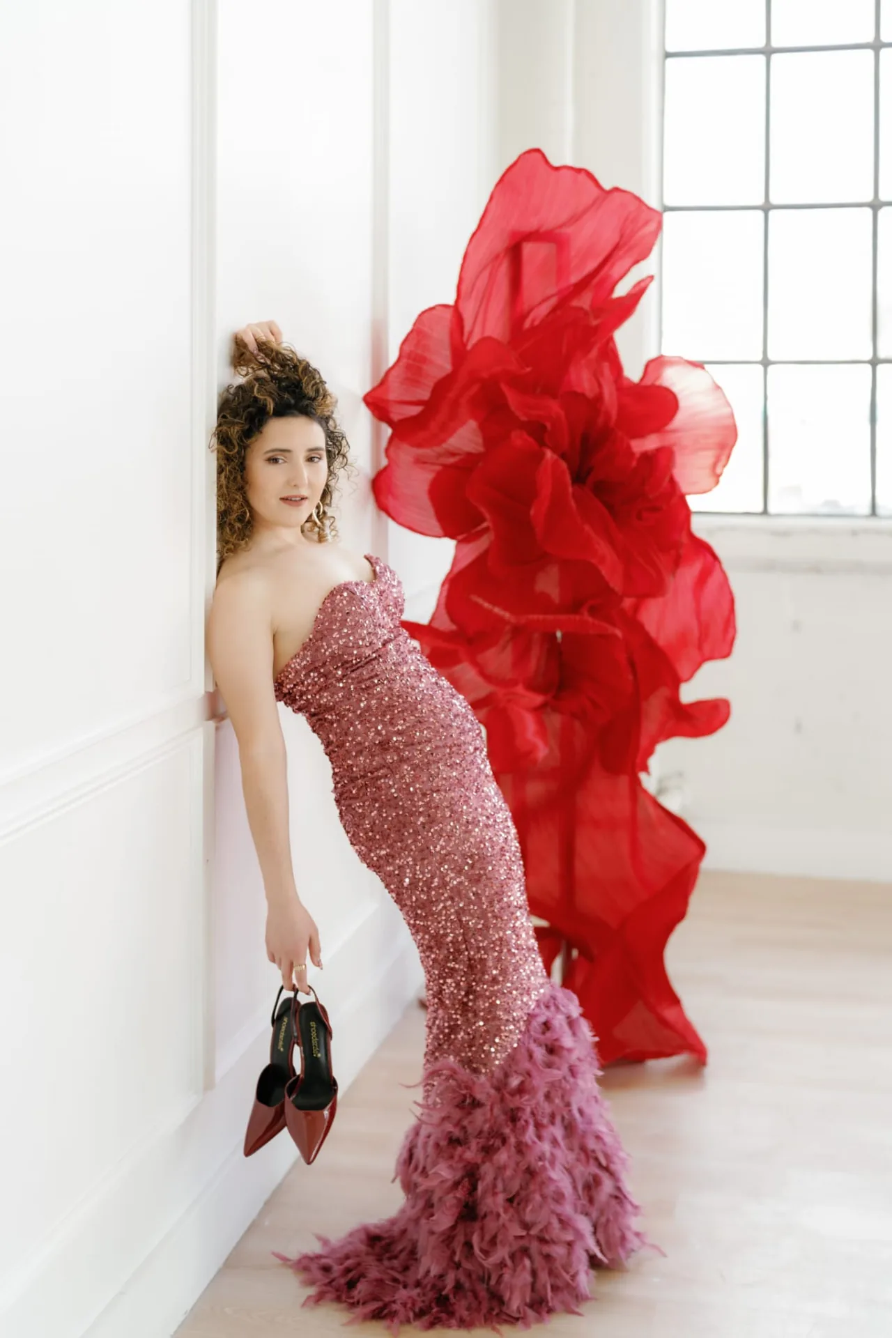Oversized red fabric flower sculpture
